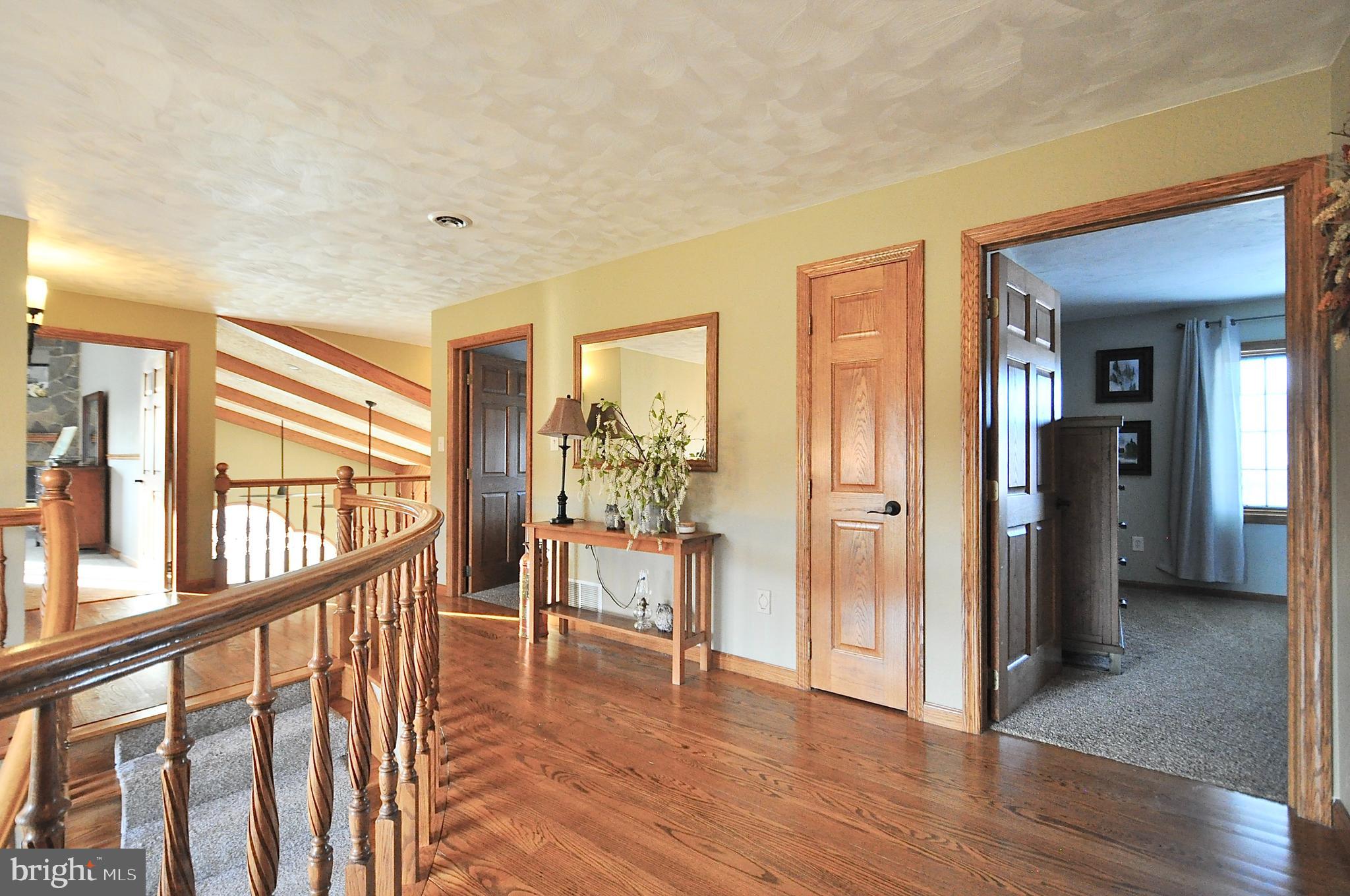 13370 South Eagle Valley Road Tyrone, PA 16686 - Photo 27 of 43 a view of an entryway with wooden floor and door