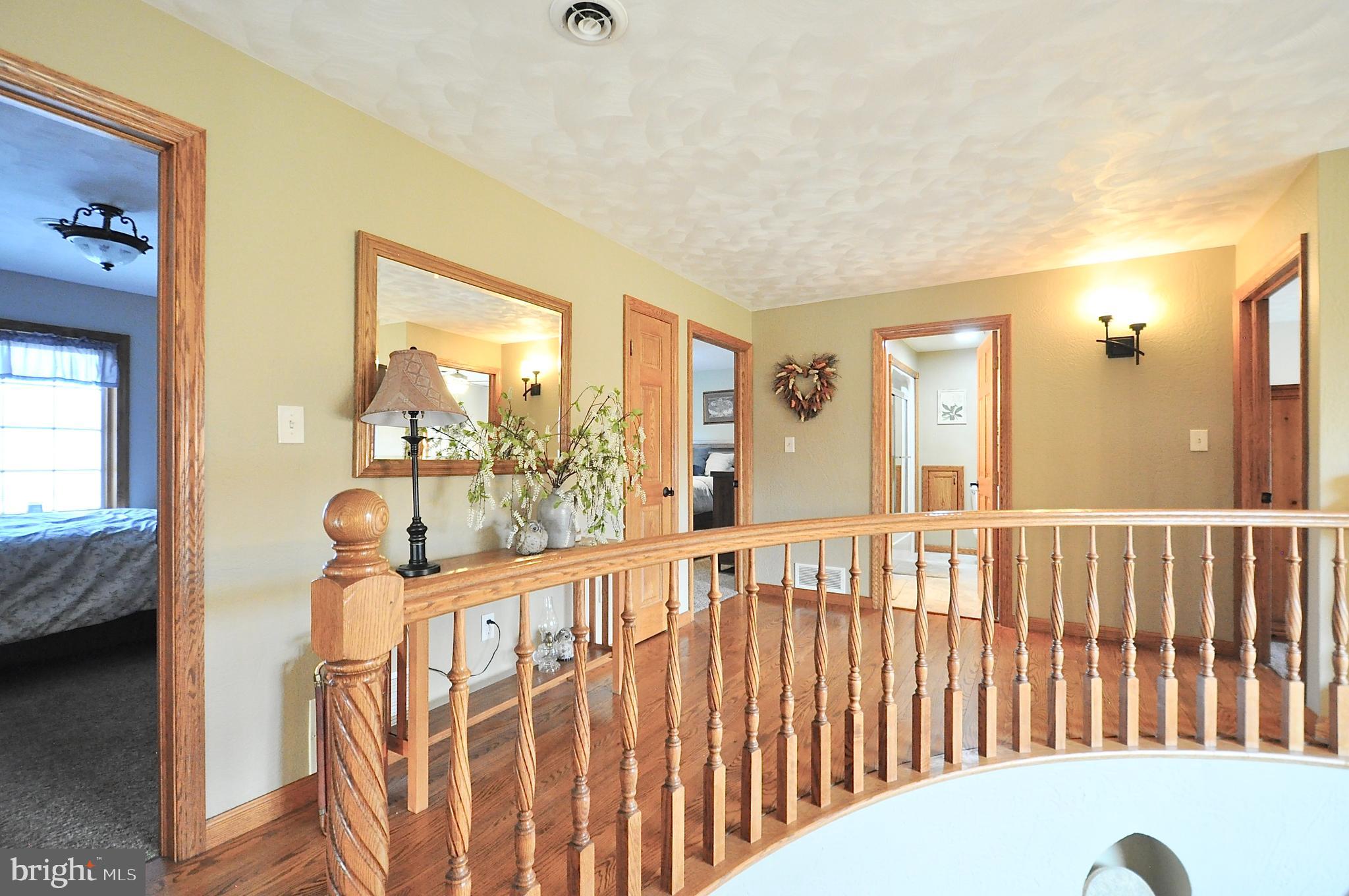 13370 South Eagle Valley Road Tyrone, PA 16686 - Photo 29 of 43 a view of a porch with wooden floor