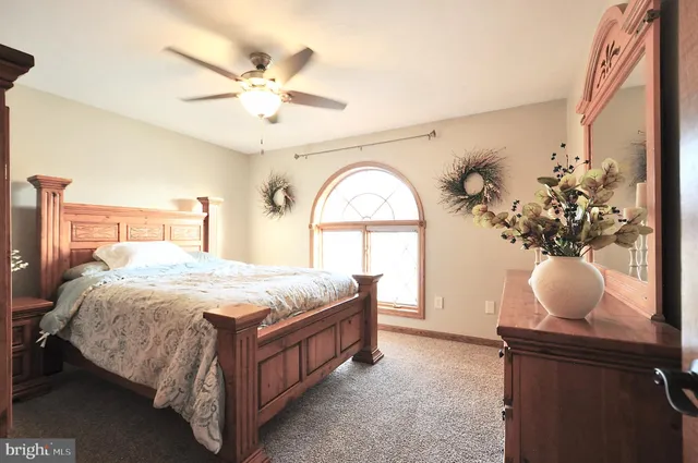 a bathroom with a tub and shower