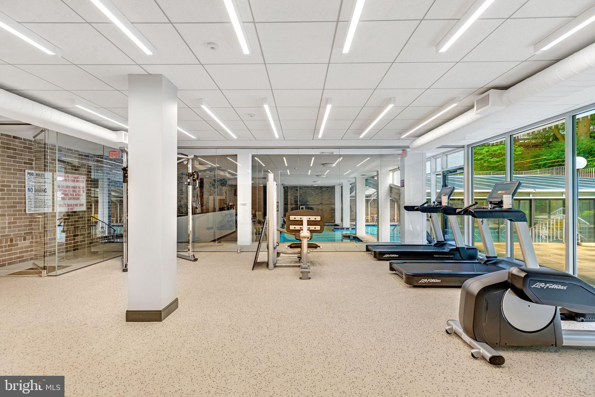 4100 Cathedral Avenue Northwest, Unit 712 Washington, DC 20016 - Photo 21 of 24 a room with gym equipment and pool table