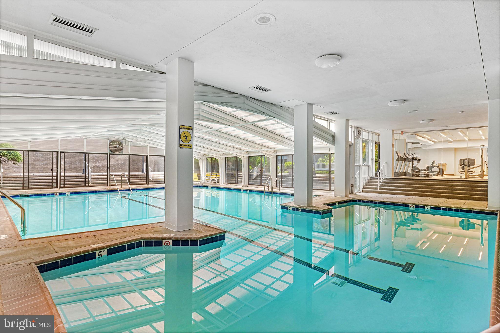 4100 Cathedral Avenue Northwest, Unit 712 Washington, DC 20016 - Photo 23 of 24 a view of a house with a backyard