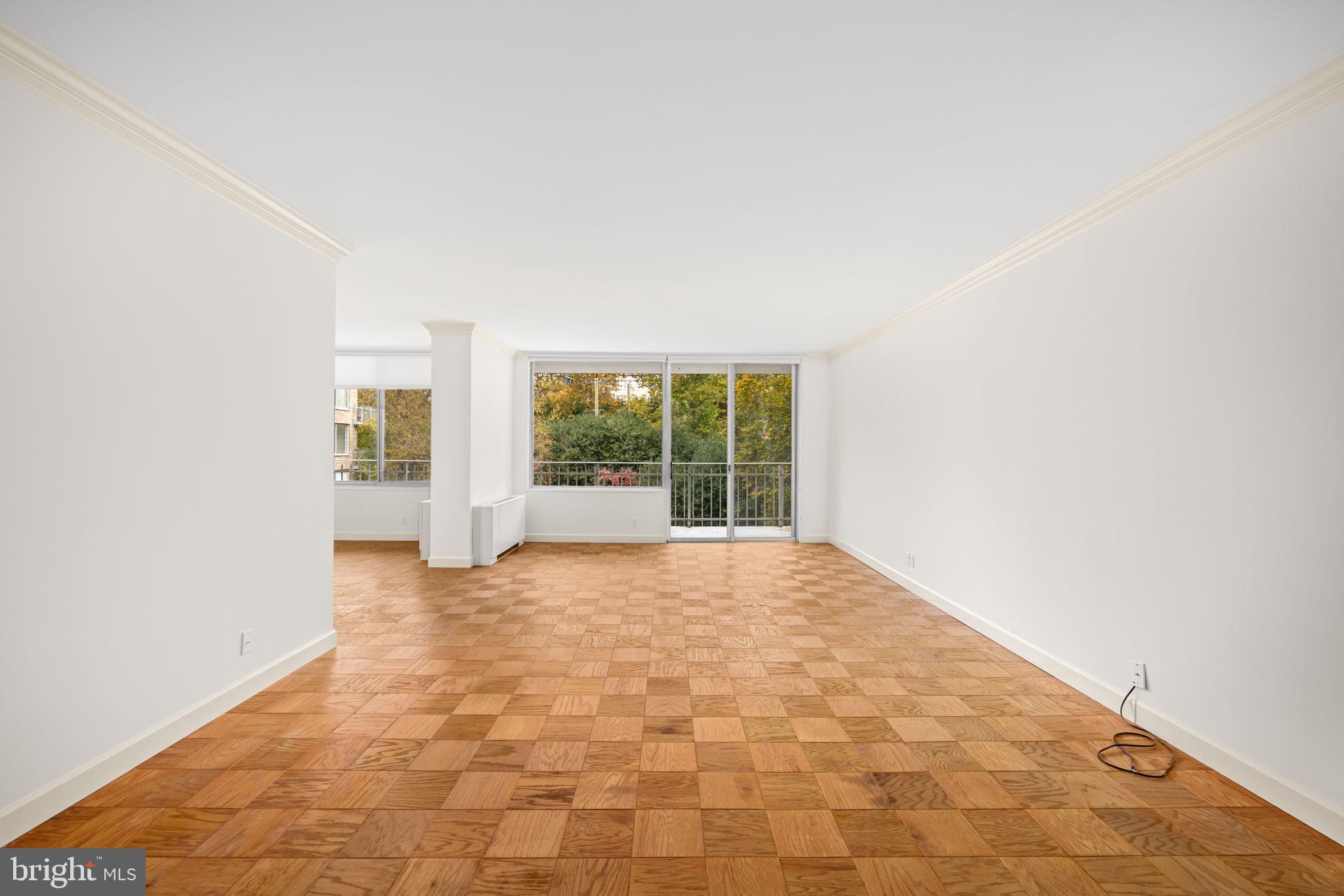 4100 Cathedral Avenue Northwest, Unit 712 Washington, DC 20016 - Photo 3 of 24 a view of an empty room with a window