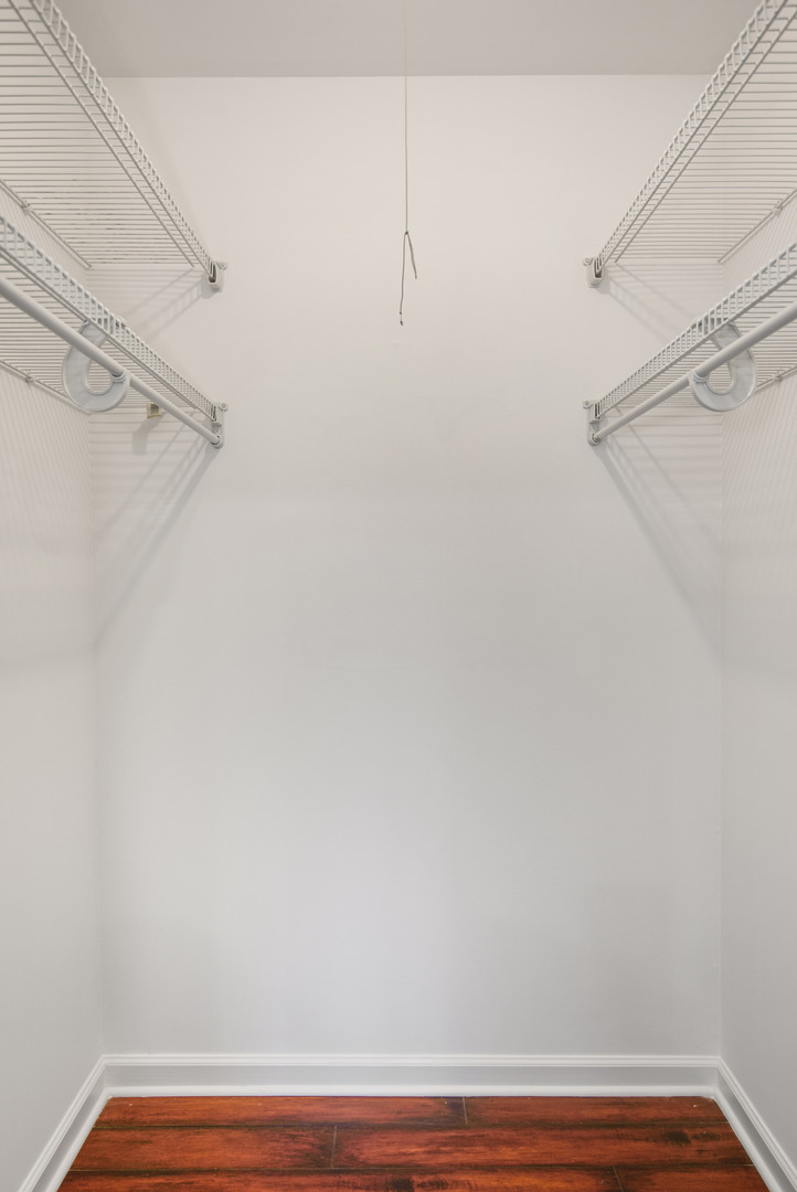 1168 Middlebury Lane, Unit A1 Wheeling, IL 60090 - Photo 16 of 28 a view of small space with racks on the wall