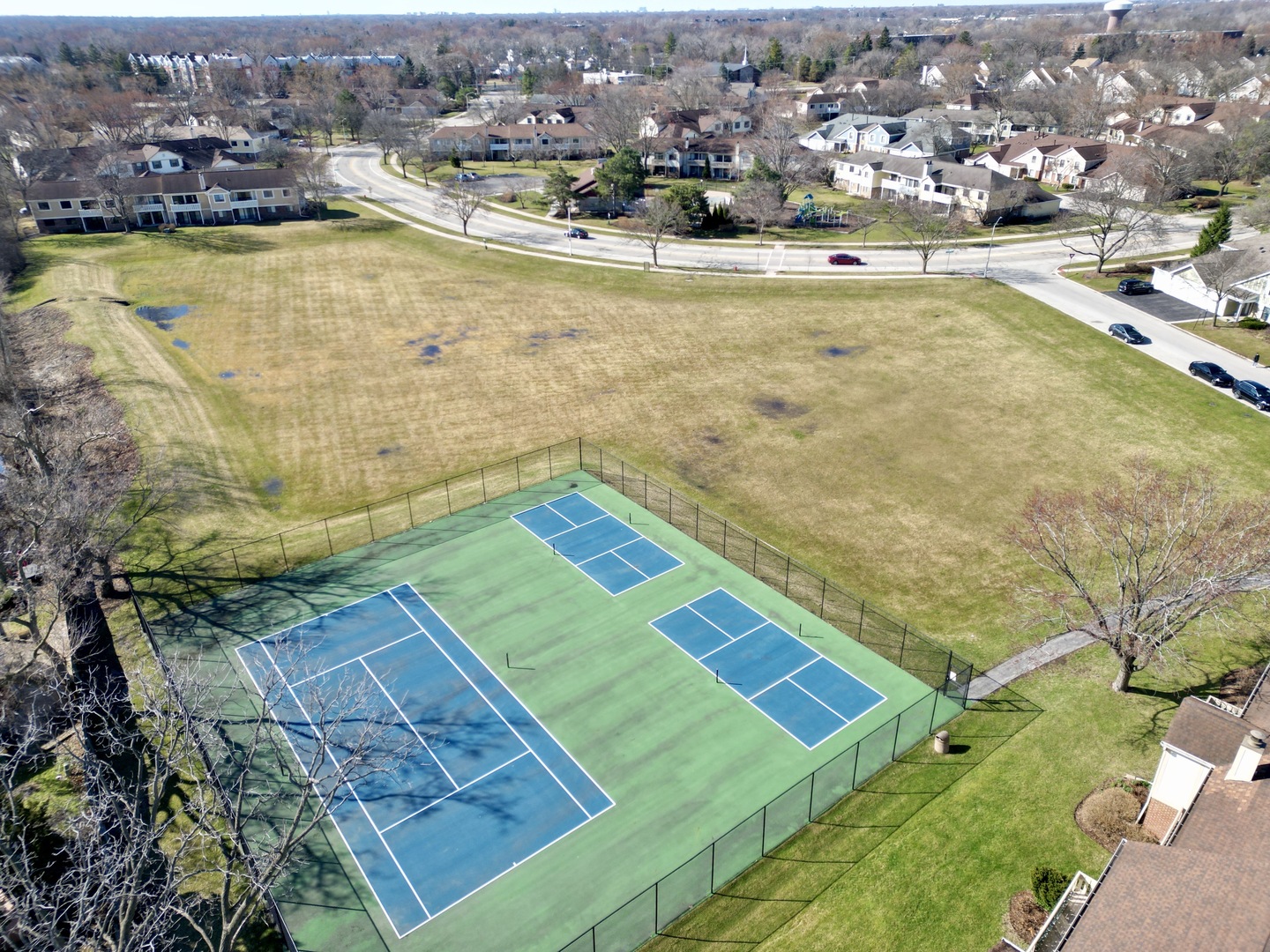 1168 Middlebury Lane, Unit A1 Wheeling, IL 60090 - Photo 27 of 28 an aerial view of residential houses with outdoor space