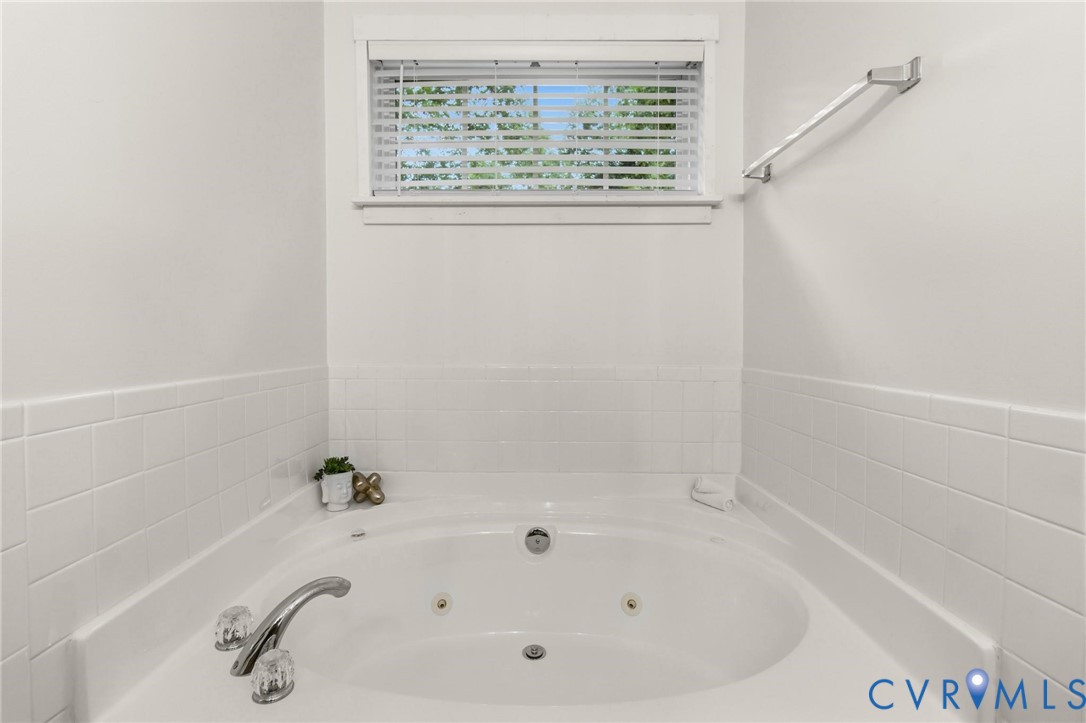 7807 Clover Ridge Place Chesterfield, VA 23832 - Photo 33 of 51 Built-in soaking tub with chrome fixtures, white t