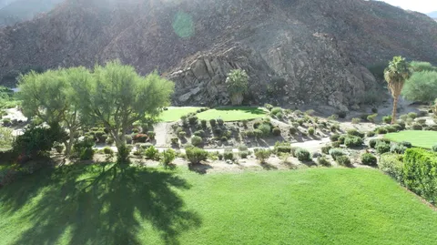 a backyard of a building and trees