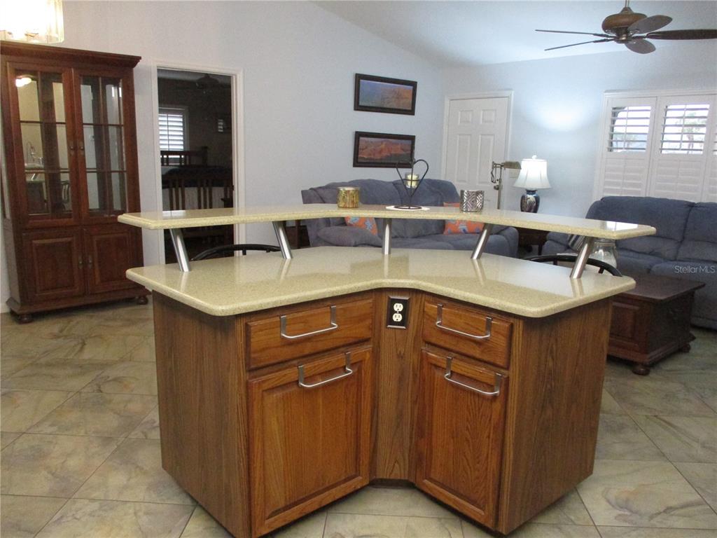 11273 Southwest 136th Place Dunnellon, FL 34432 - Photo 11 of 78 a kitchen with stainless steel appliances granite countertop a sink stove and cabinets