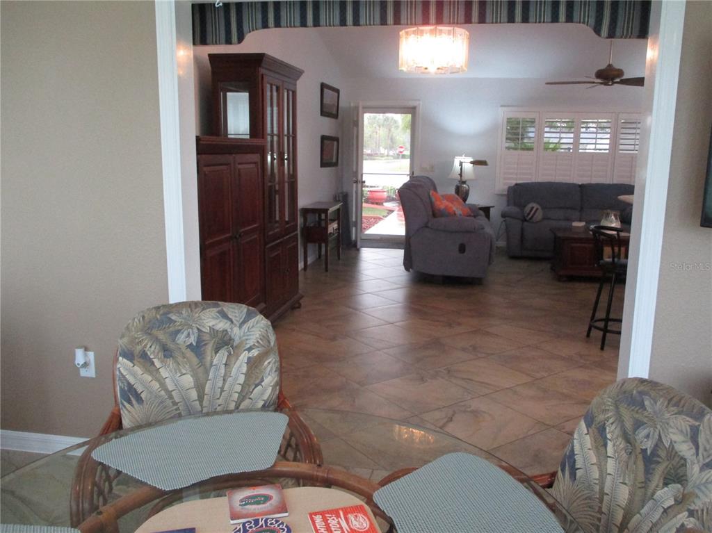 11273 Southwest 136th Place Dunnellon, FL 34432 - Photo 16 of 78 a living room with furniture and a window