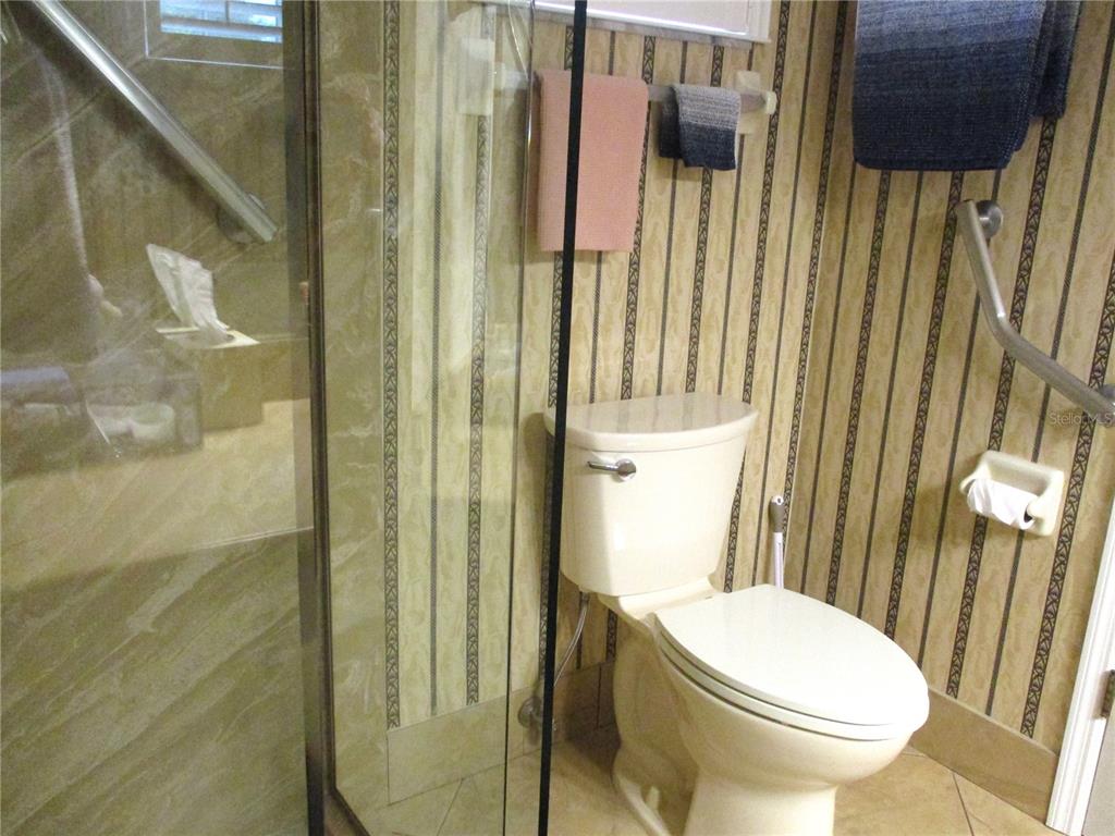 11273 Southwest 136th Place Dunnellon, FL 34432 - Photo 29 of 78 a bathroom with a toilet and a shower