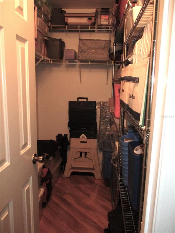 11273 Southwest 136th Place Dunnellon, FL 34432 - Photo 34 of 78 a view of walk in closet with clothes and shoes