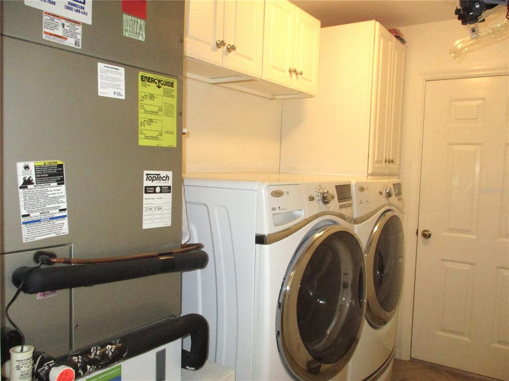 11273 Southwest 136th Place Dunnellon, FL 34432 - Photo 38 of 78 a utility room with dryer and washer