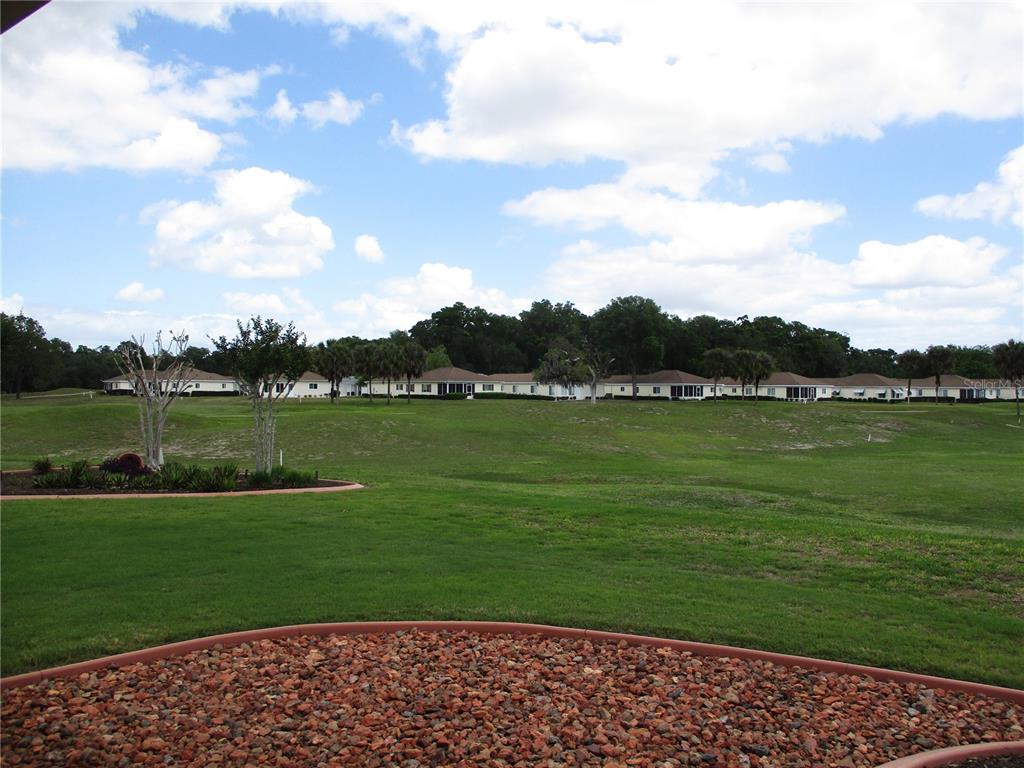 11273 Southwest 136th Place Dunnellon, FL 34432 - Photo 4 of 78 a view of a lake with a big yard