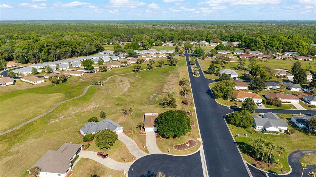 11273 Southwest 136th Place Dunnellon, FL 34432 - Photo 50 of 78 an aerial view of residential houses with outdoor space