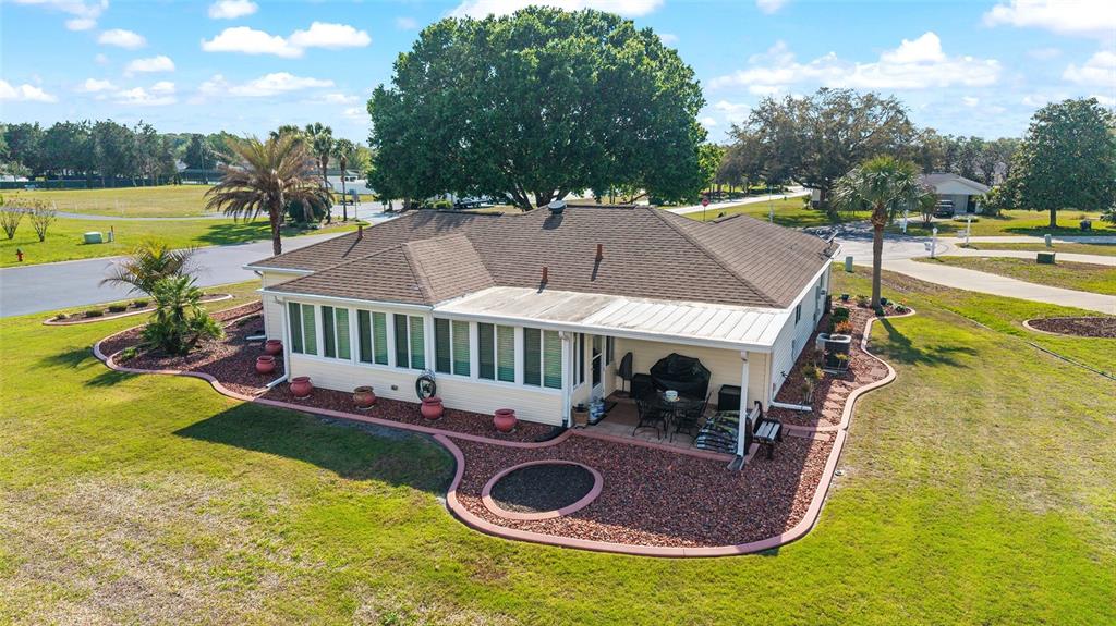 11273 Southwest 136th Place Dunnellon, FL 34432 - Photo 52 of 78 an aerial view of a house with swimming pool and big yard