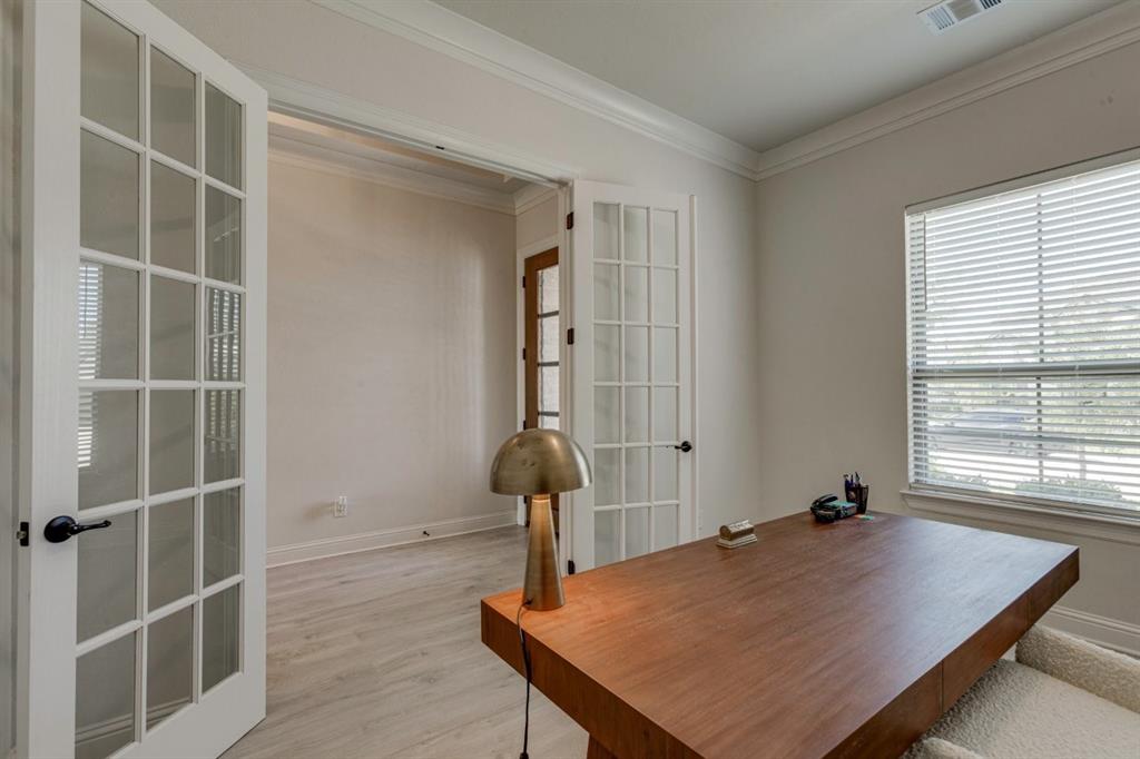 9613 Boulder Pt Road Oak Point, TX 75068 - Photo 5 of 28 Room featuring double French doors, crown molding, a window with blinds, light-toned wood-finish flooring, and neutral wall tones