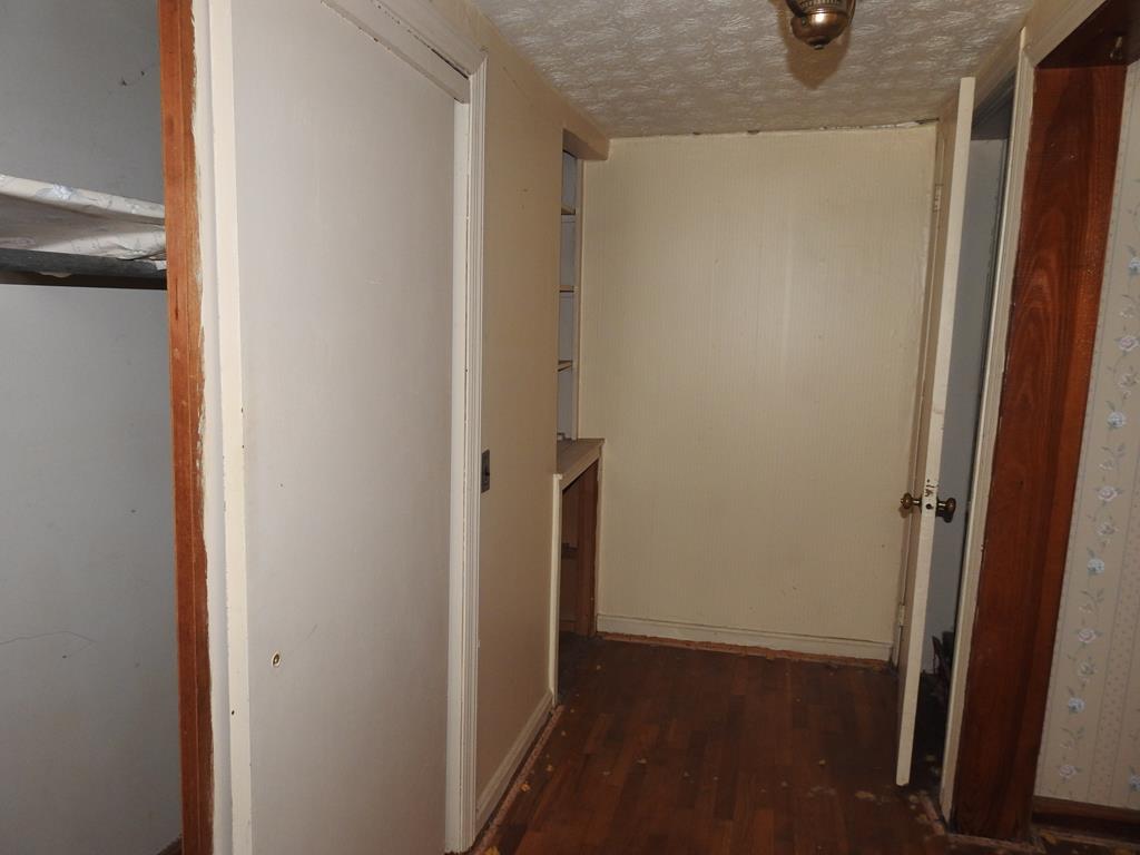 333 Lickskillet Road Epworth, GA 30541 - Photo 19 of 32 a view of hallway with wooden floor