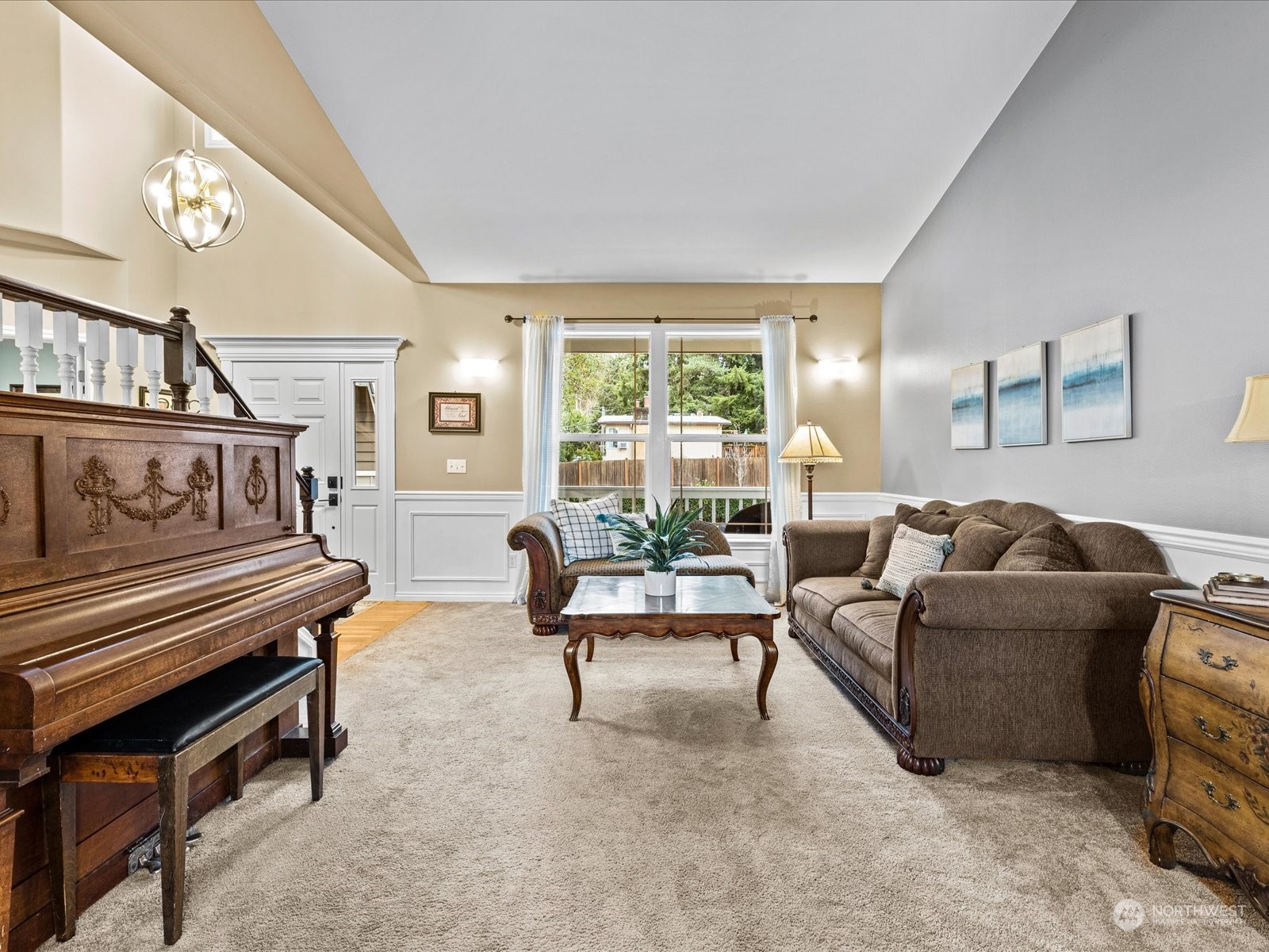 9506 Northeast 191st Street Bothell, WA 98011 - Photo 11 of 40 a living room with furniture and a piano