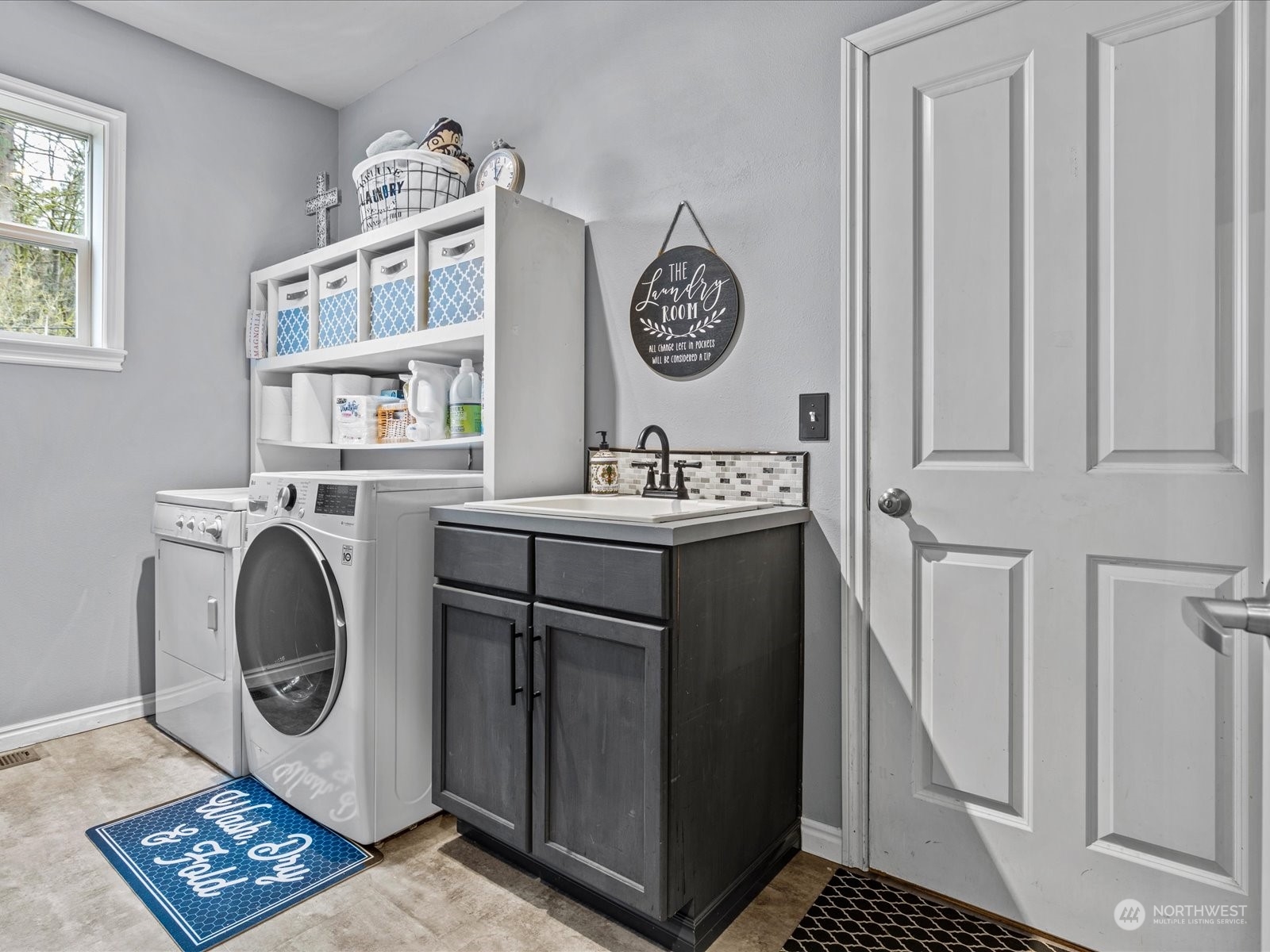 9506 Northeast 191st Street Bothell, WA 98011 - Photo 24 of 40 a utility room with dryer and washer
