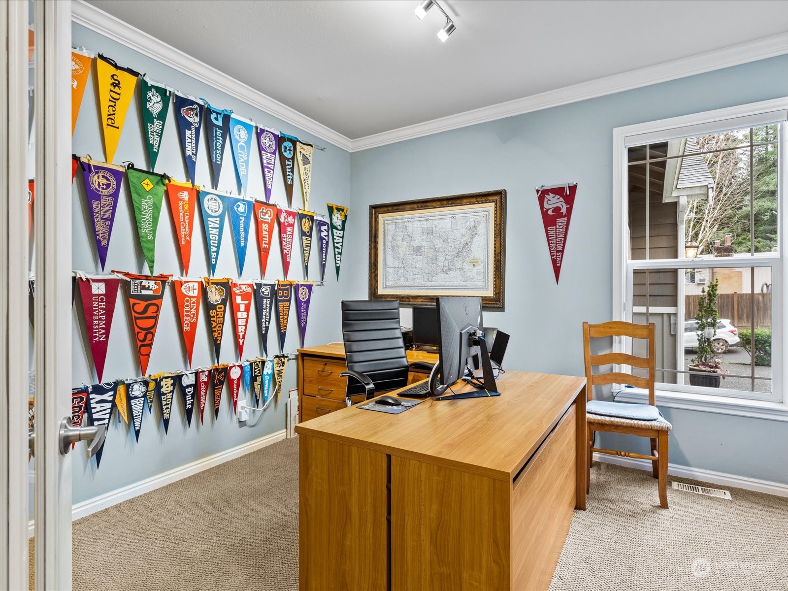 9506 Northeast 191st Street Bothell, WA 98011 - Photo 27 of 40 a view of a workspace with furniture and toys
