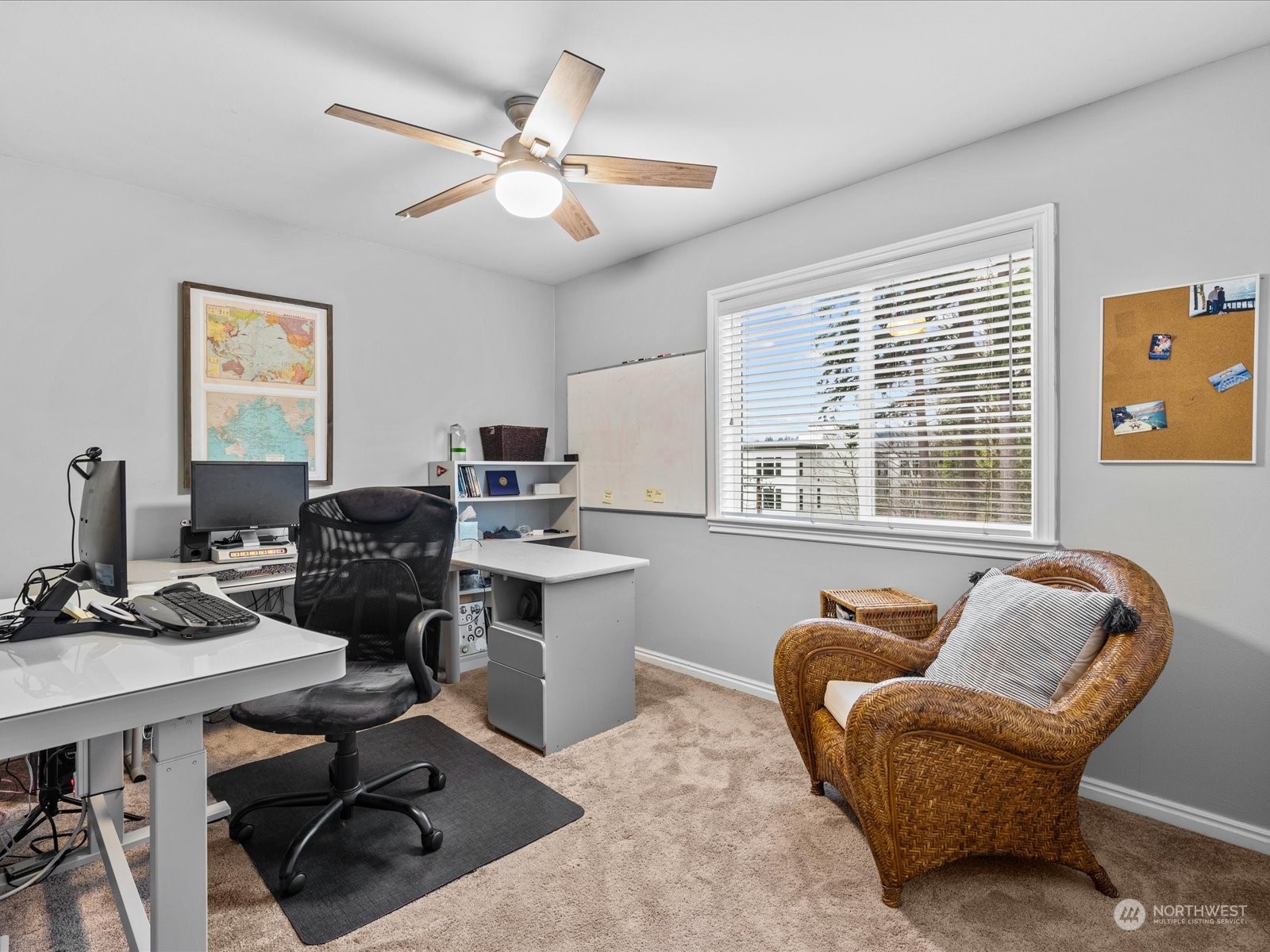 9506 Northeast 191st Street Bothell, WA 98011 - Photo 30 of 40 a workspace with furniture and a window