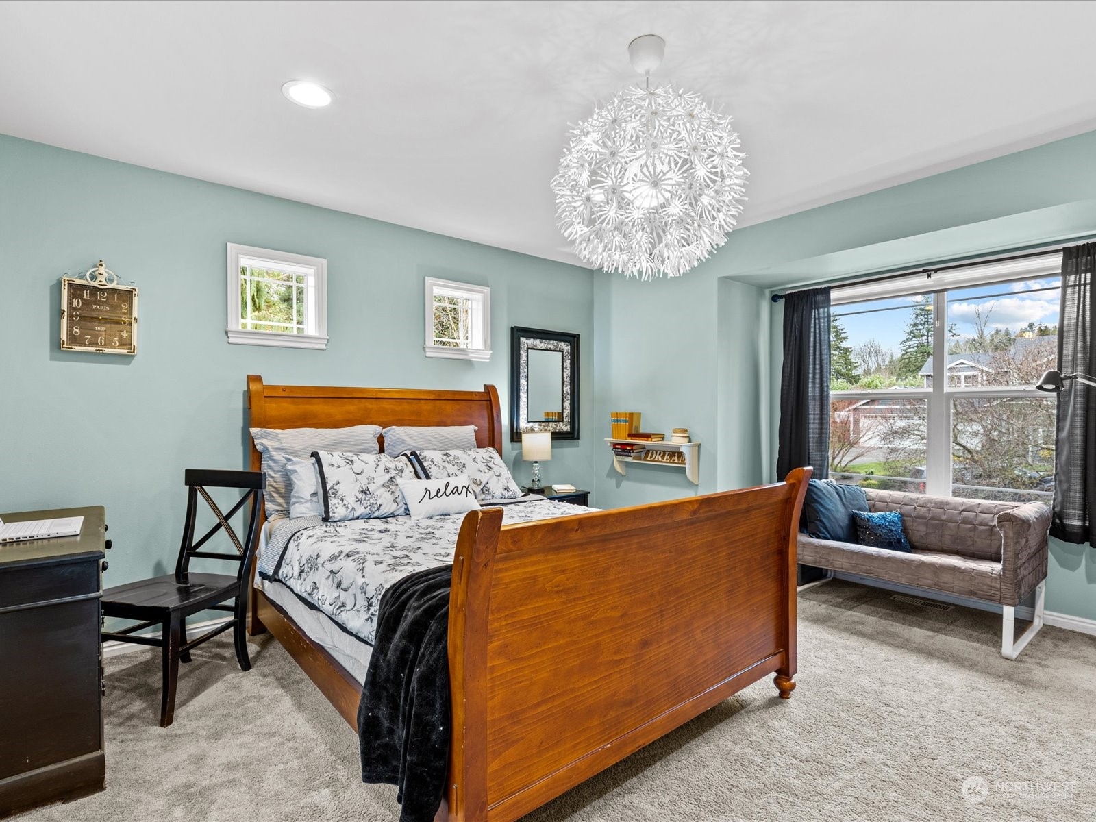 9506 Northeast 191st Street Bothell, WA 98011 - Photo 33 of 40 a living room with furniture and a large window