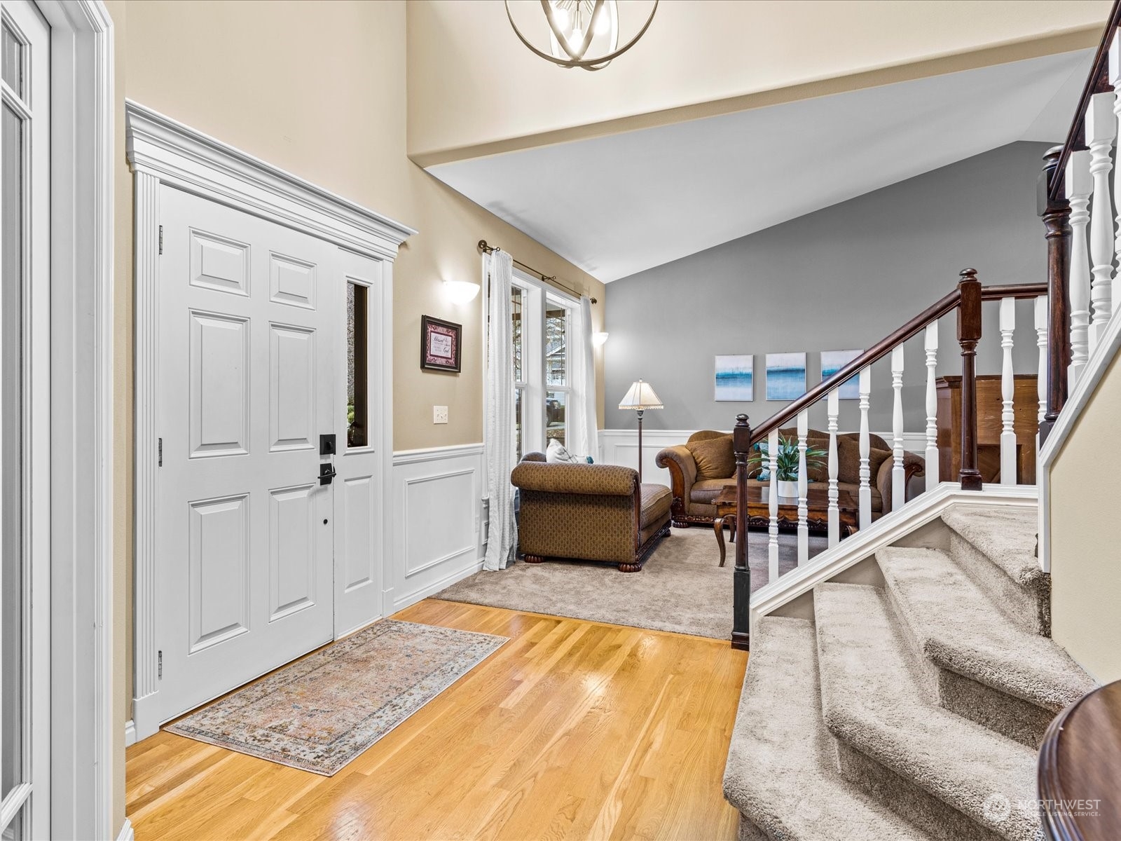 9506 Northeast 191st Street Bothell, WA 98011 - Photo 7 of 40 a bedroom with furniture and a wooden floor