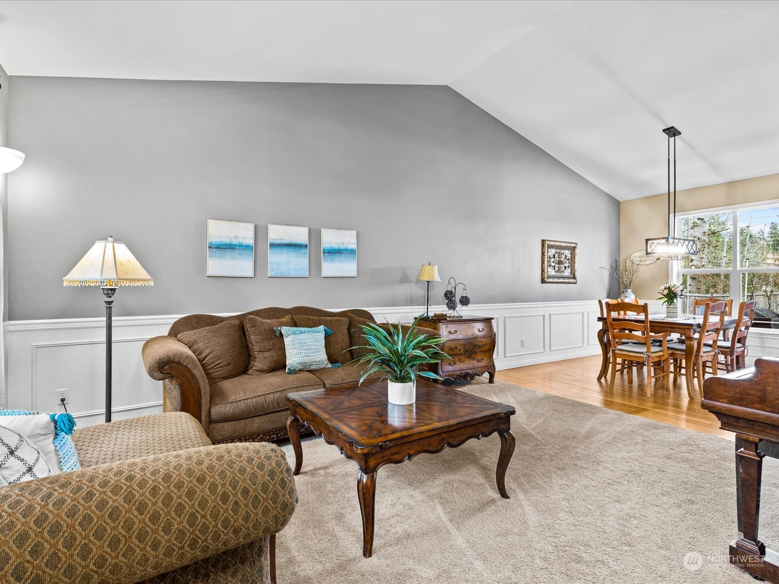 9506 Northeast 191st Street Bothell, WA 98011 - Photo 9 of 40 a living room with furniture and a table