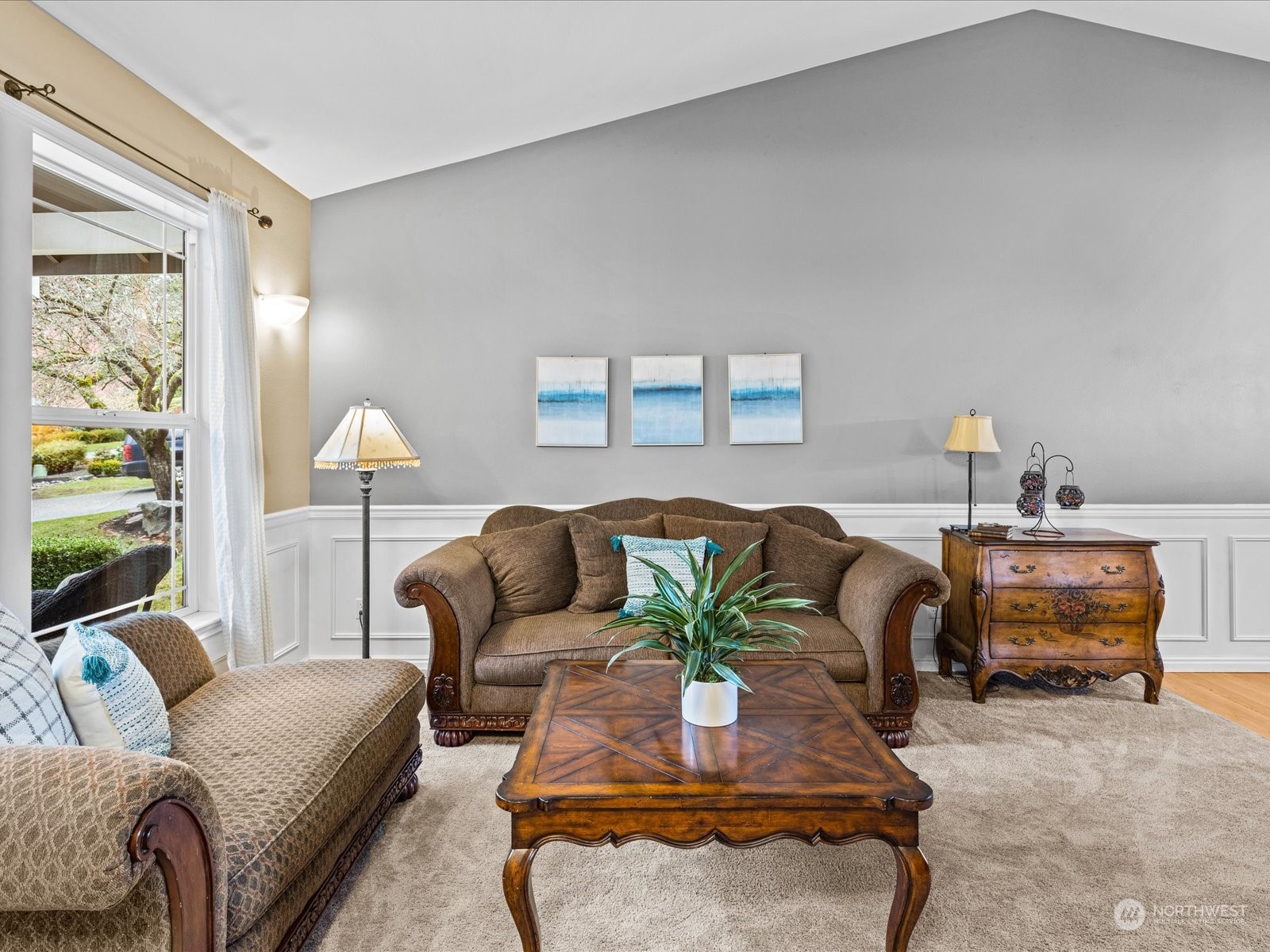 9506 Northeast 191st Street Bothell, WA 98011 - Photo 10 of 40 a living room with furniture lamp and a large window