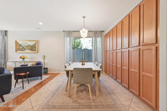 a view of room with window and wooden floor