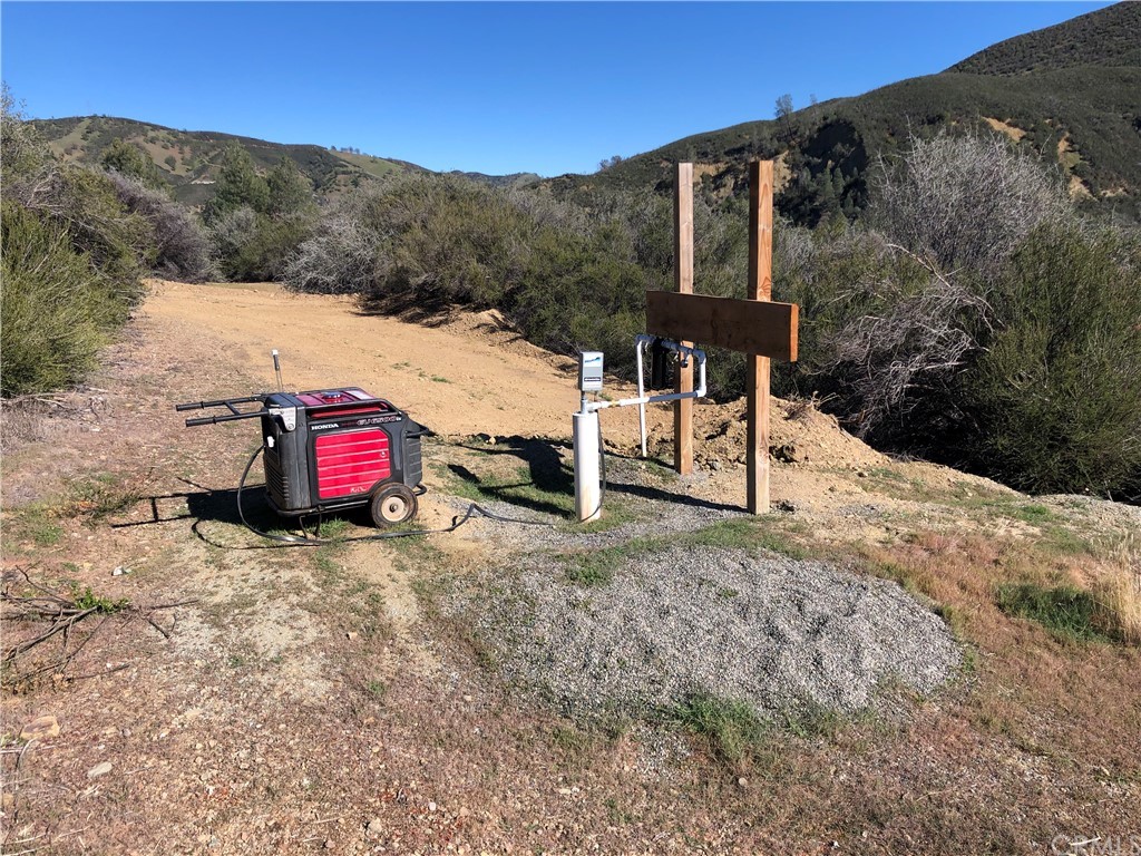 21356 State Highway 20 Clearlake Oaks, CA 95423 - Photo 2 of 13 a view of a house with a yard