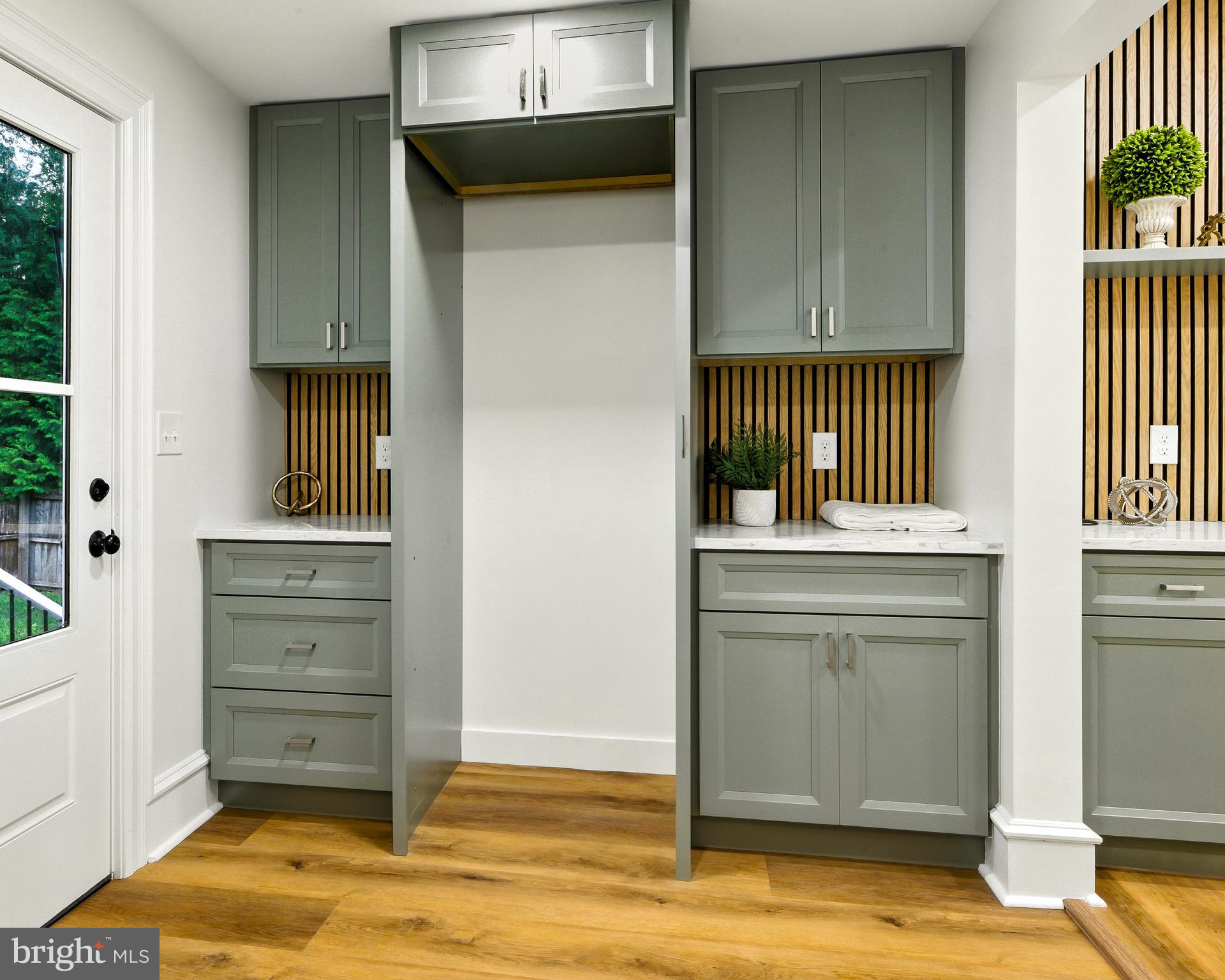 713 Main Street Riverton, NJ 08077 - Photo 13 of 36 a view of a hallway to a room with wooden floor windows and entryway