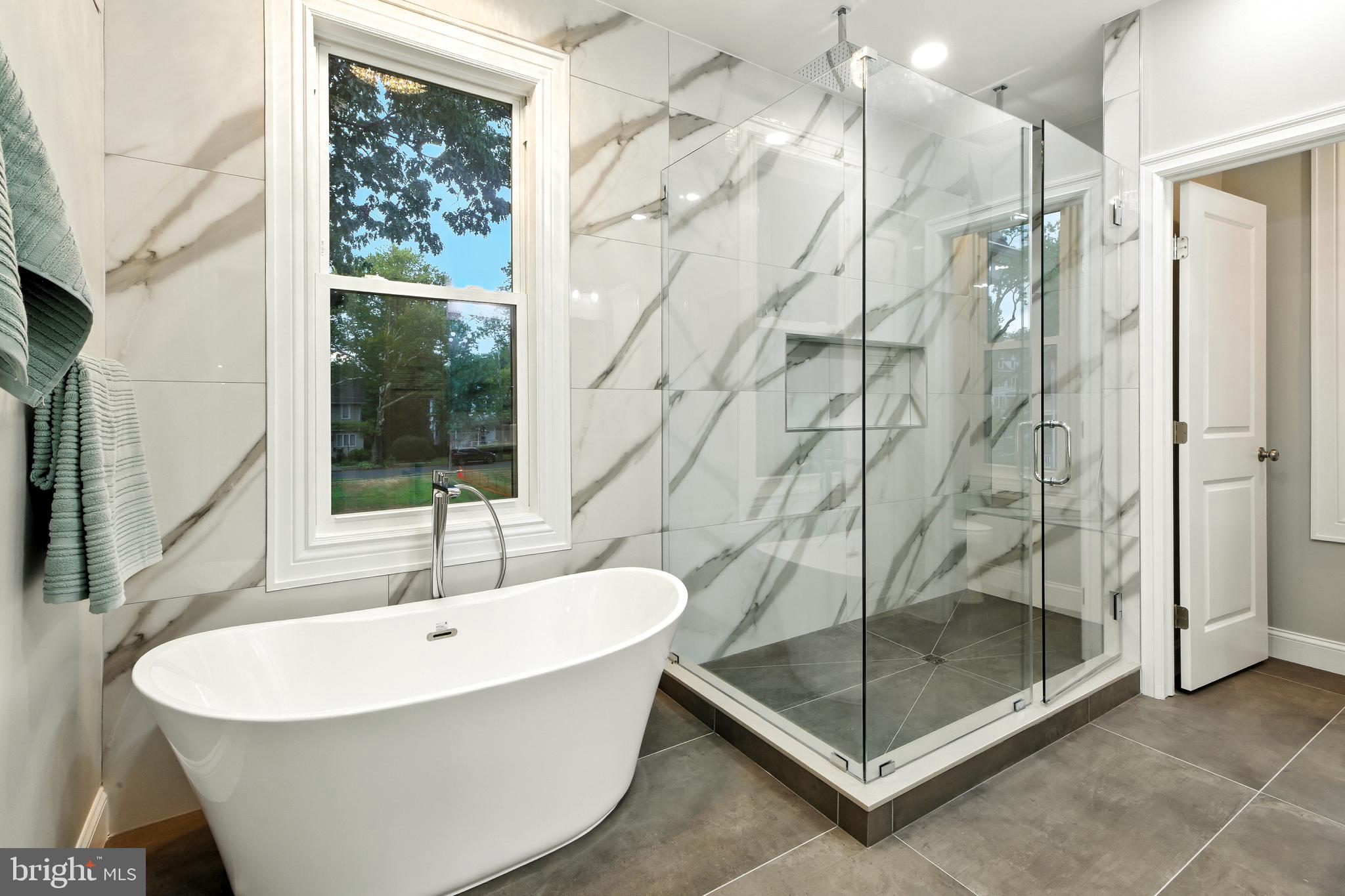 713 Main Street Riverton, NJ 08077 - Photo 15 of 36 a bathroom with a bathtub and shower