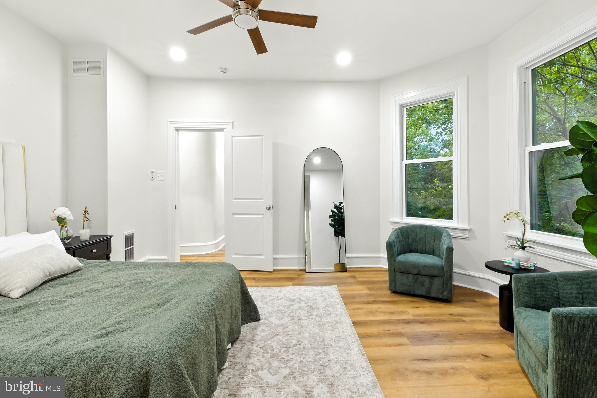 713 Main Street Riverton, NJ 08077 - Photo 21 of 36 a bedroom with a large bed couch and a window