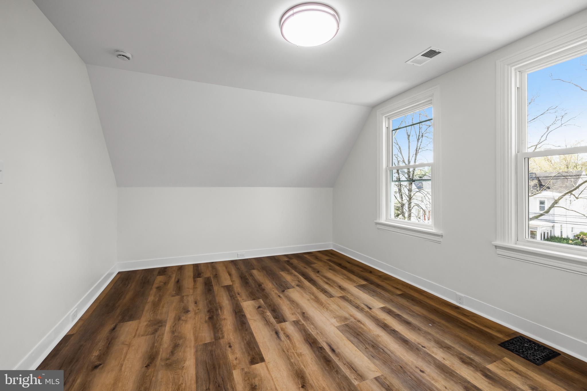 713 Main Street Riverton, NJ 08077 - Photo 29 of 36 wooden floor in an empty room with a window