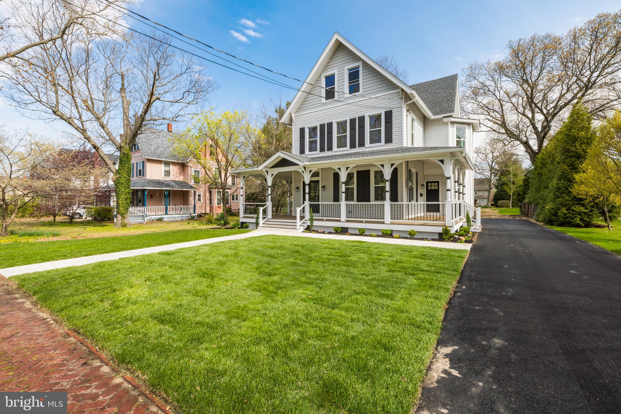 713 Main Street Riverton, NJ 08077 - Photo 31 of 36 a front view of a building with a yard