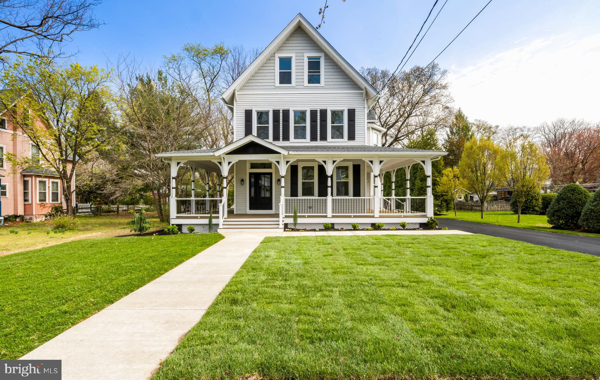 713 Main Street Riverton, NJ 08077 - Photo 32 of 36 a front view of a house with yard and green space