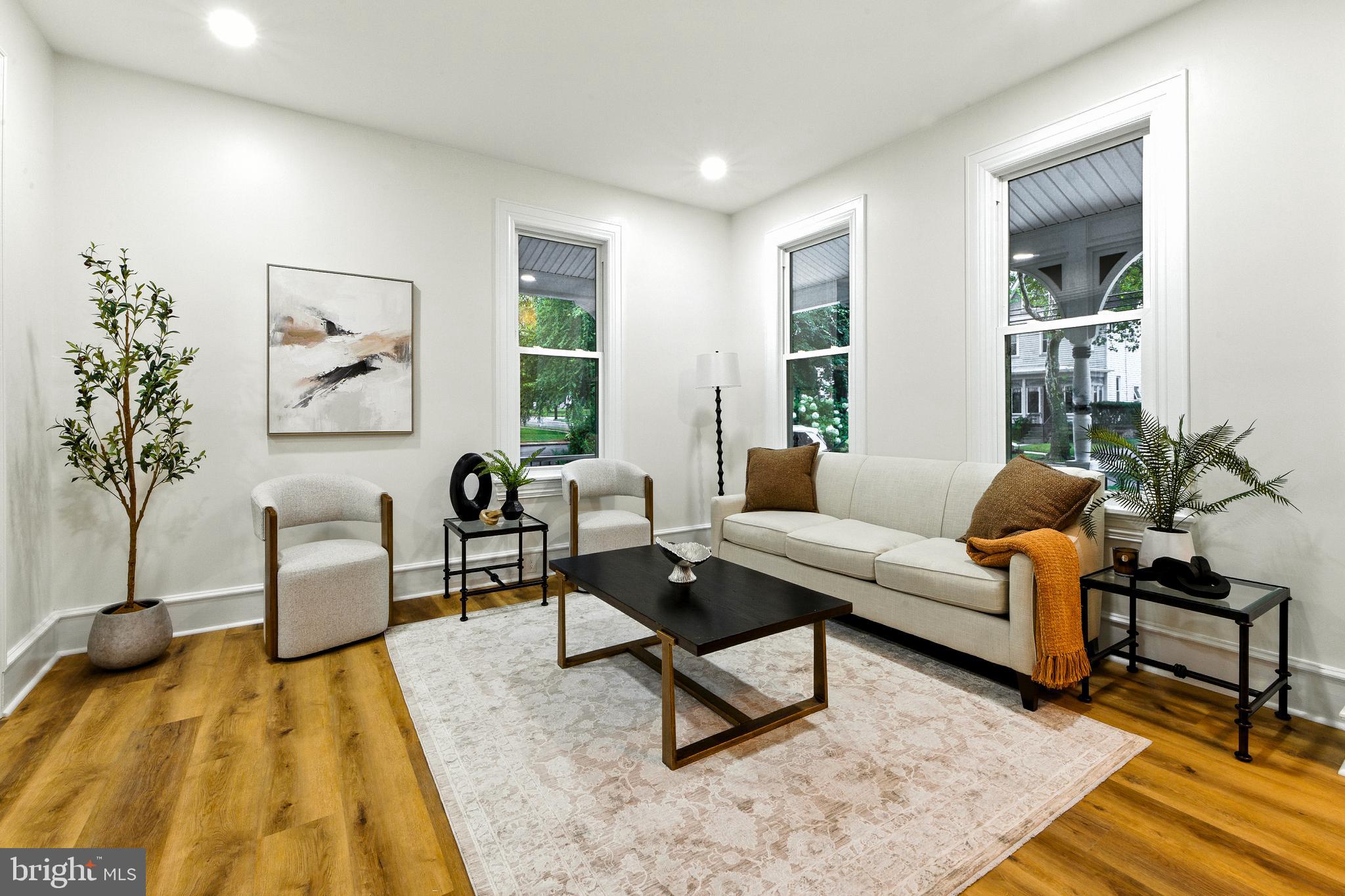 713 Main Street Riverton, NJ 08077 - Photo 9 of 36 a living room with furniture and a rug