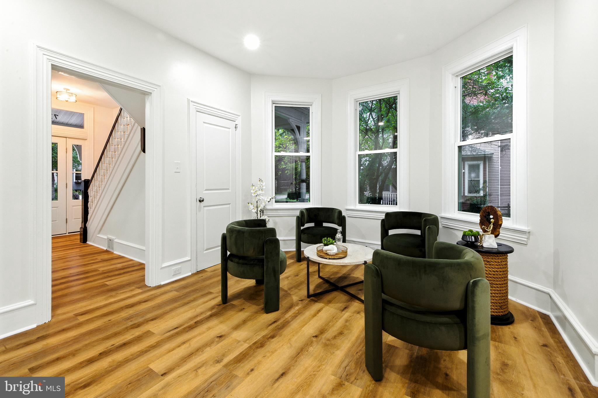 713 Main Street Riverton, NJ 08077 - Photo 10 of 36 a living room with furniture and a table