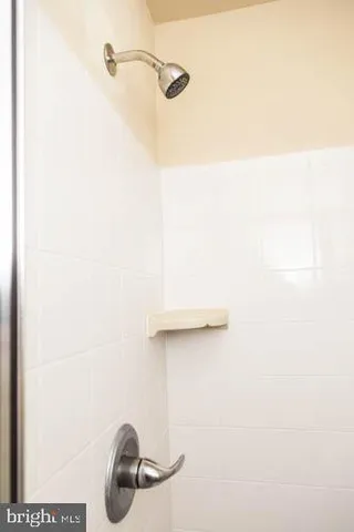 a close view of a shower in the bathroom