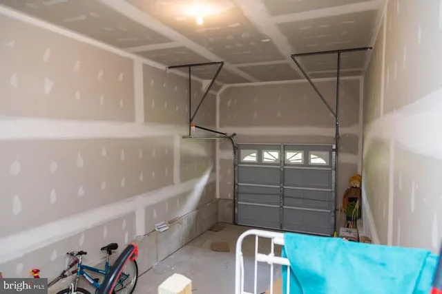 a view of a room with racks and windows