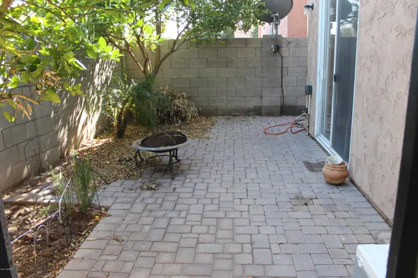a view of a pathway both side of house