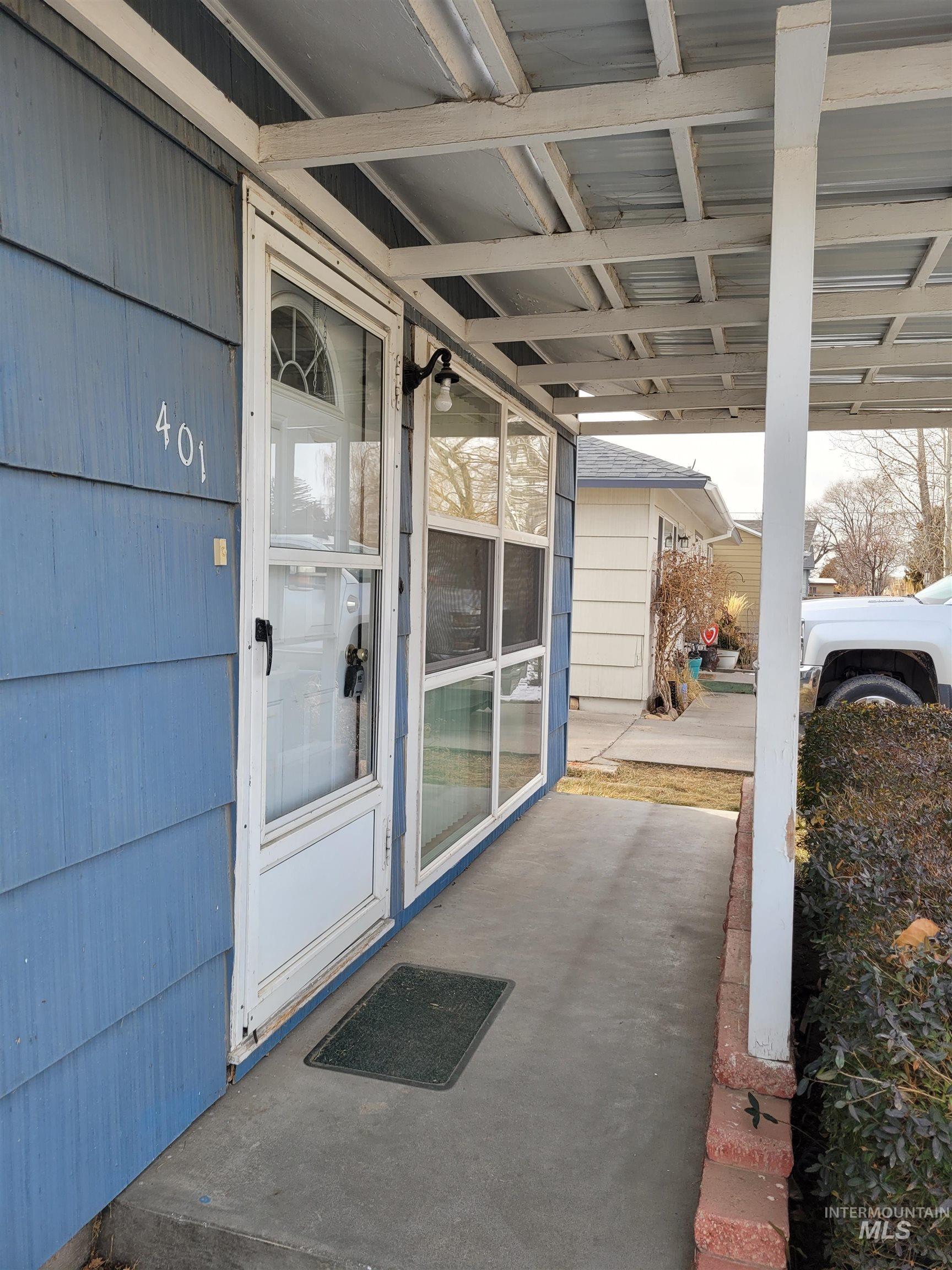 401 South 4th Street Rupert, ID 83350 - Photo 2 of 19 Entrance to property featuring covered porch
