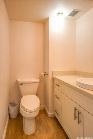 a bathroom with a toilet and a sink