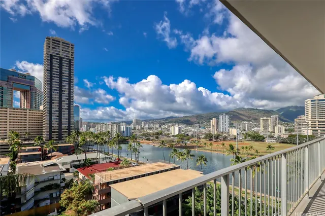 a view of a balcony with city view