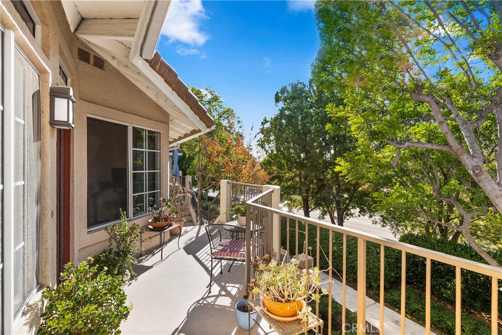 27 Castano Rancho Santa Margarita, CA 92688 - Photo 3 of 24 a view of balcony with furniture and trees