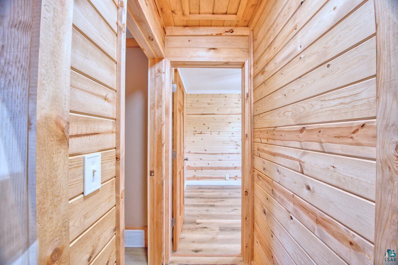 802 3rd Street Northwest Chisholm, MN 55719 - Photo 19 of 51 Hallway with wooden walls