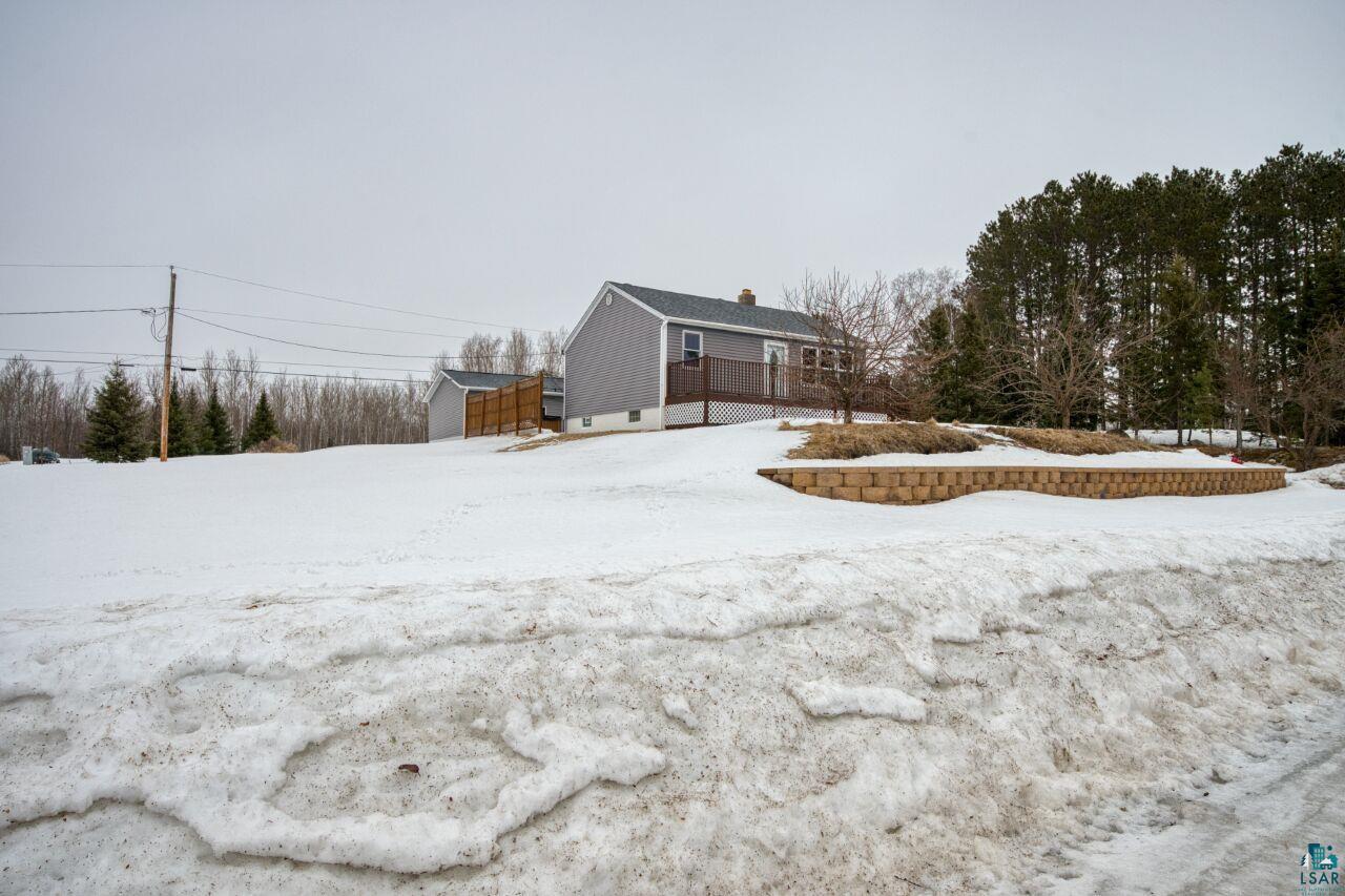 802 3rd Street Northwest Chisholm, MN 55719 - Photo 33 of 51 View of yard covered in snow