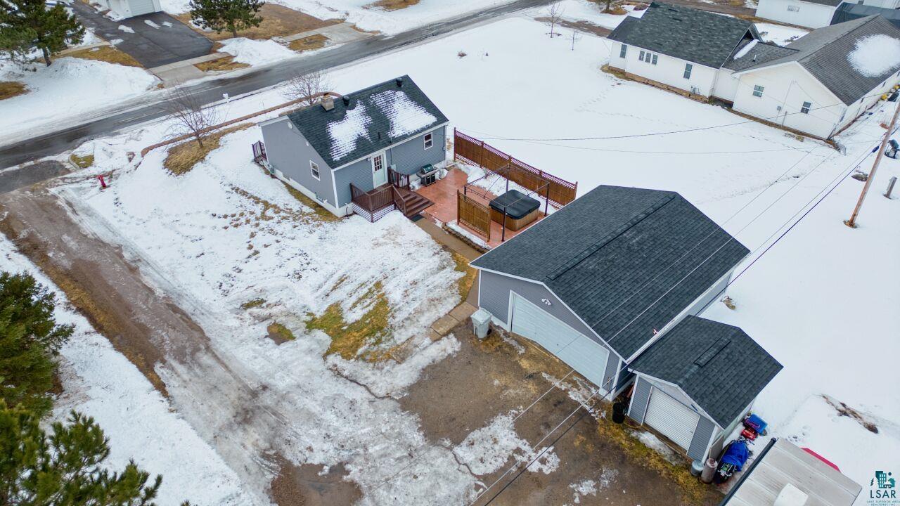 802 3rd Street Northwest Chisholm, MN 55719 - Photo 39 of 51 Snowy aerial view with a residential view