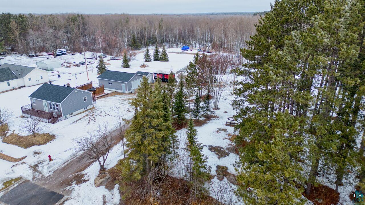 802 3rd Street Northwest Chisholm, MN 55719 - Photo 47 of 51 Snowy aerial view with a forest view