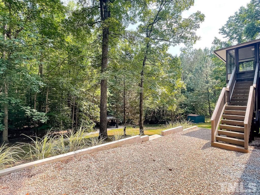 6700 Laurdane Road Raleigh, NC 27613 - Photo 23 of 25 a view of a park with large trees
